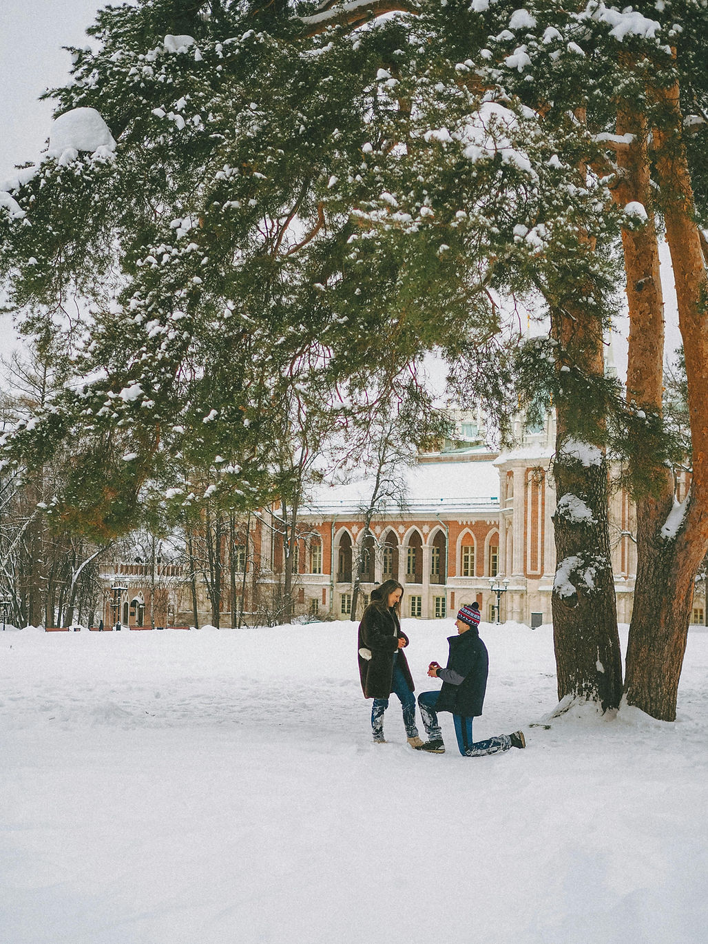 Man proposing in the snow