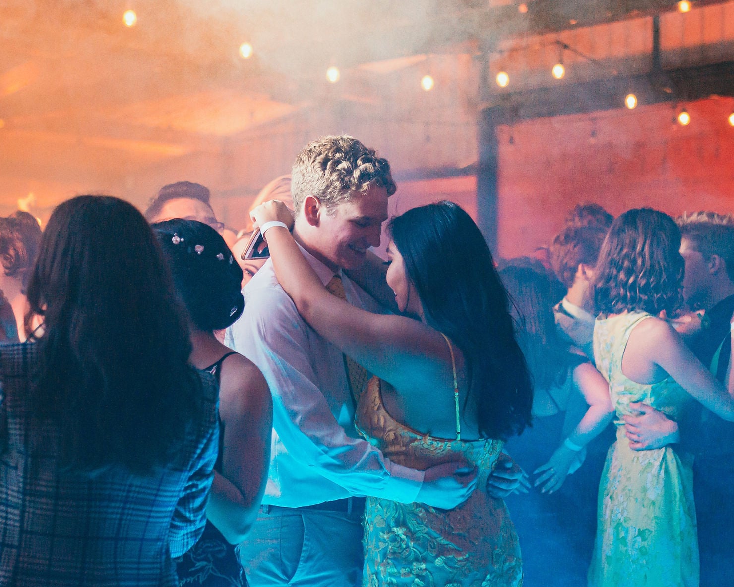 Couple slow dancing at prom