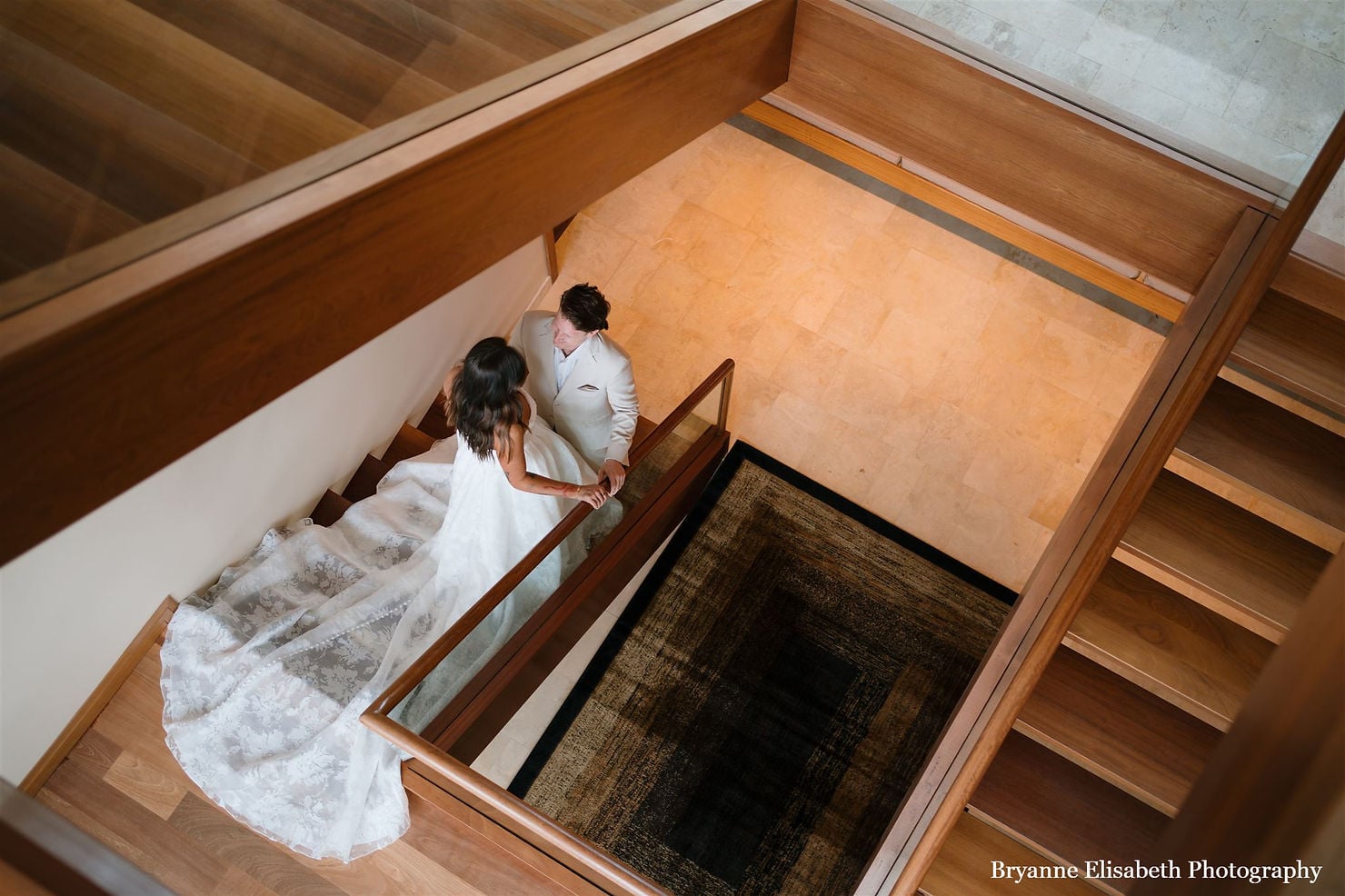 bride and groom on staircase