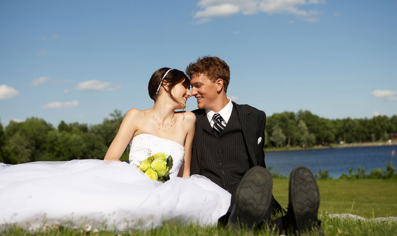 Bride and Groom by a pond